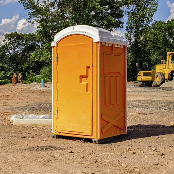 how often are the portable restrooms cleaned and serviced during a rental period in Ozawkie